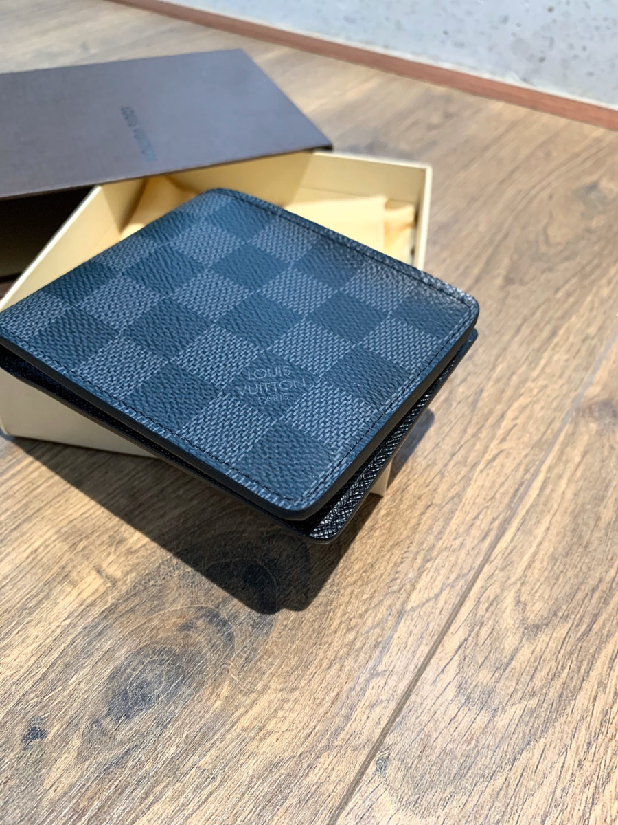 L..ouis V.uitton Damier graphite Portefeuille Slender . kèm box + túi vải như hình ạ .