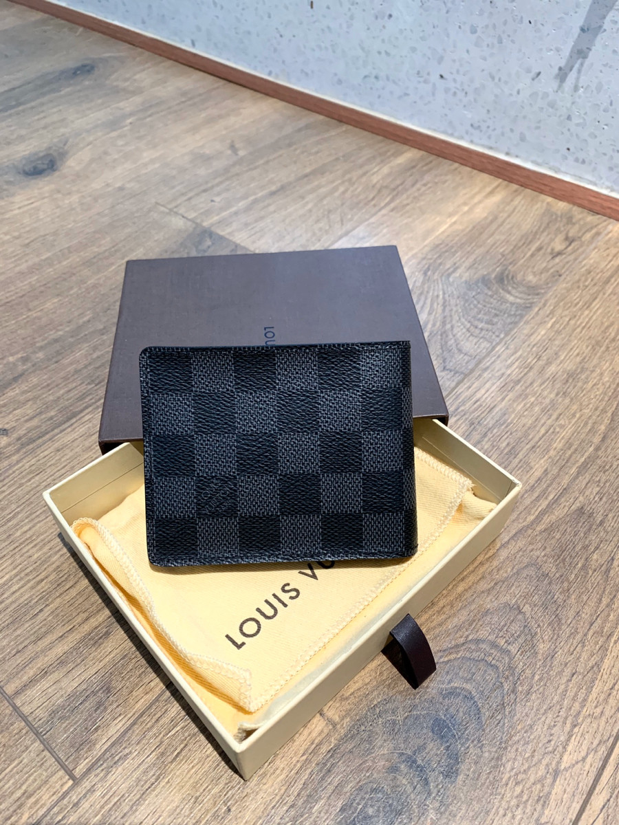 L..ouis V.uitton Damier graphite Portefeuille Slender . kèm box + túi vải như hình ạ .