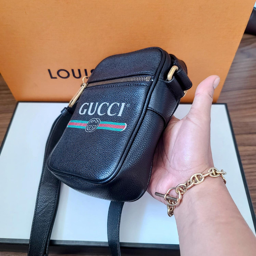 GUCCI LOGO PRINTED LEATHER MINI MESSENGER BAG