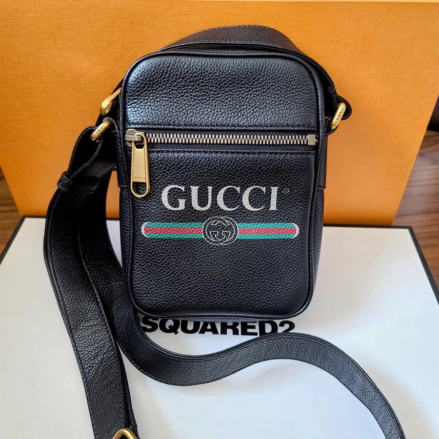 GUCCI LOGO PRINTED LEATHER MINI MESSENGER BAG