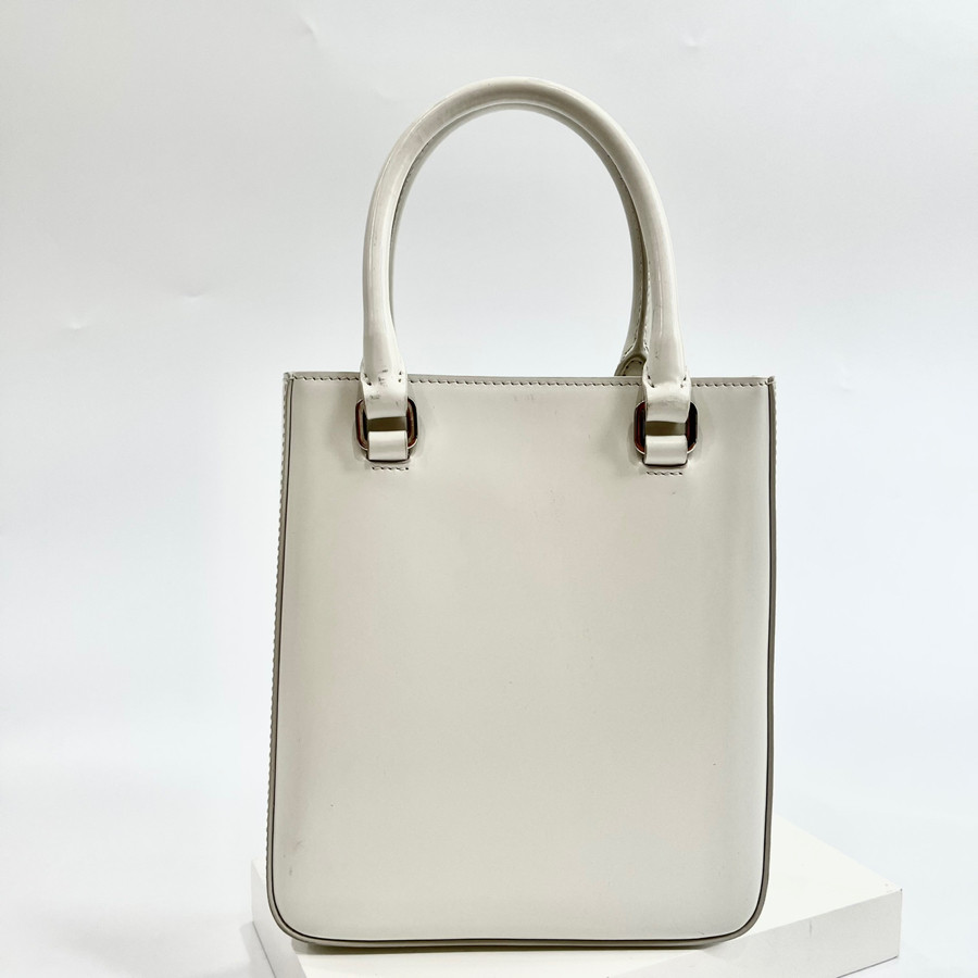 Tote trắng prada