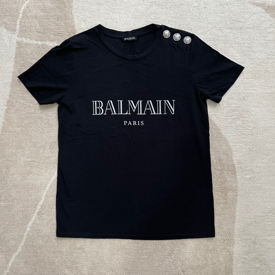 Tee bal.man chữ trắng size 36 - 97% flaw vai trước sau