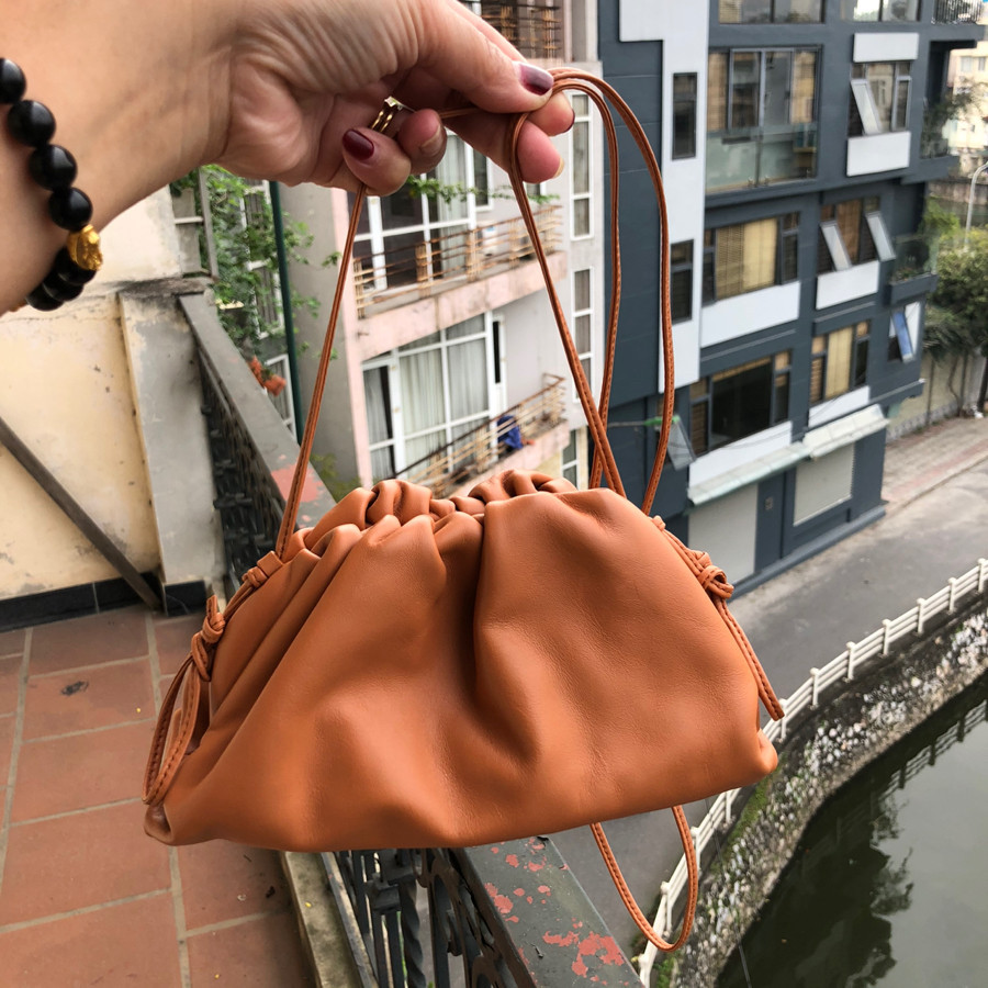 Bottega Veneta - The Mini Pouch crossbody bag - orange leather: