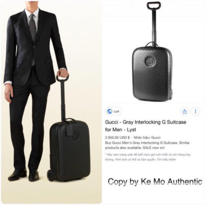 Gucci black interlocking GG suitcase