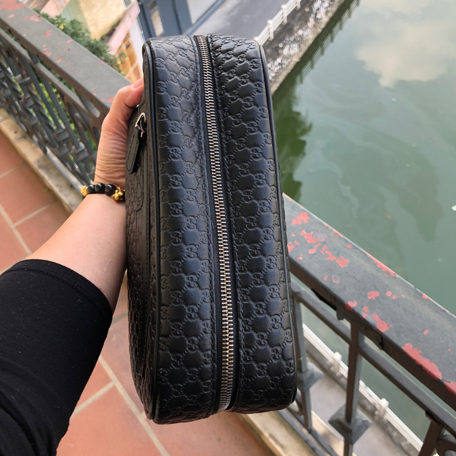 Gucci MicroGuccissima Unisex Leather Clutch Bag Black: