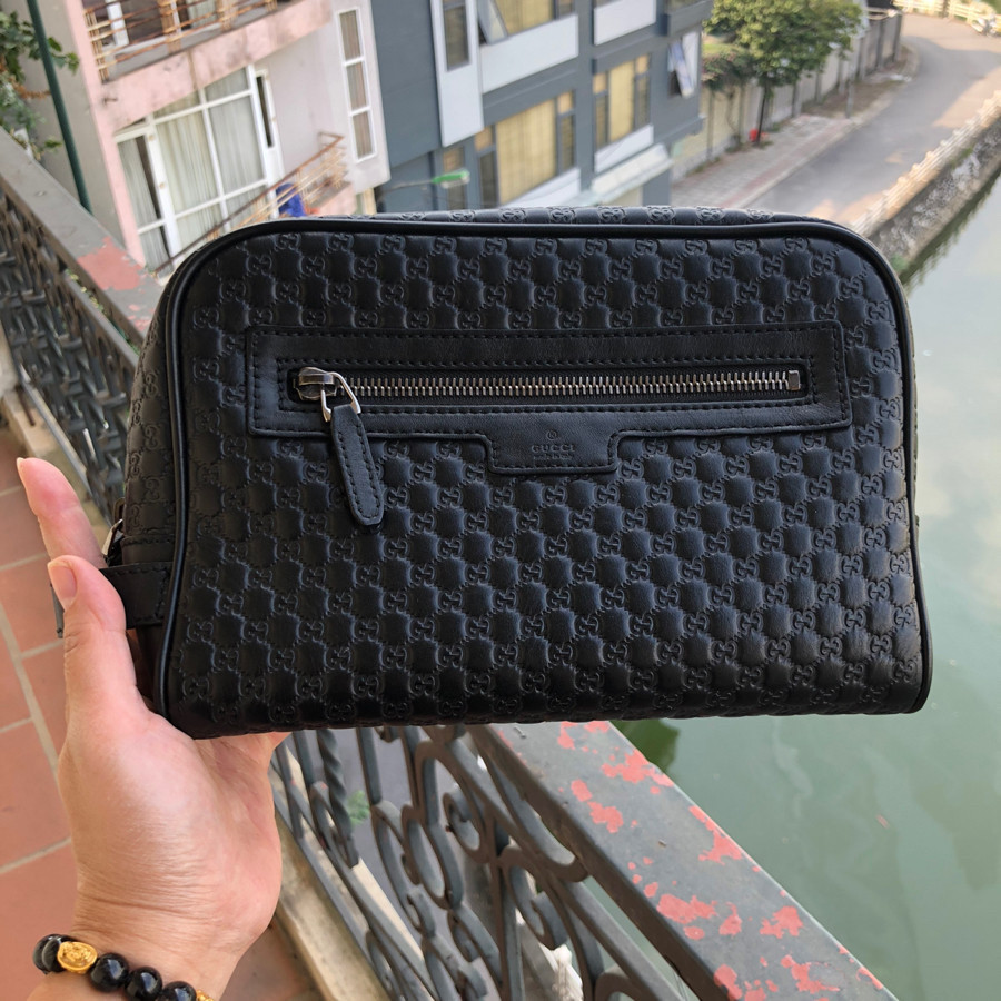 Gucci MicroGuccissima Unisex Leather Clutch Bag Black: