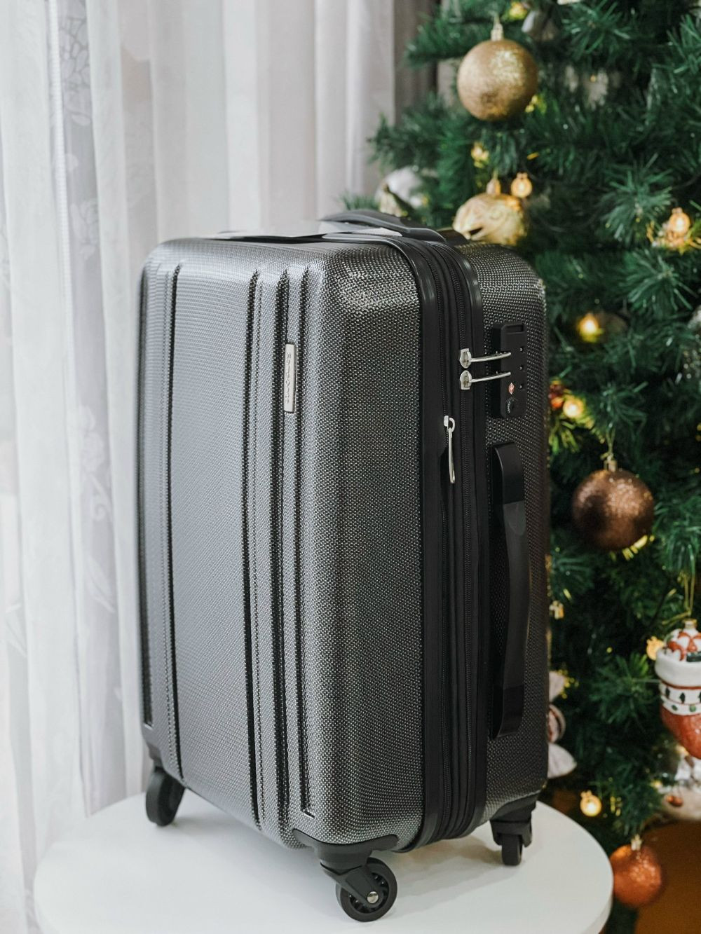 Vali Samsonite carbon có khóa số size 20