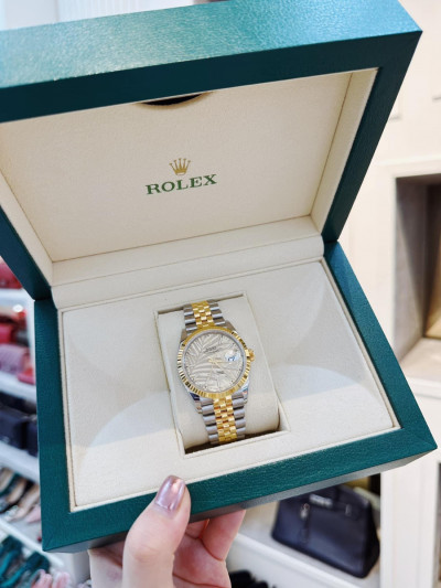 Rolex Palm Motif