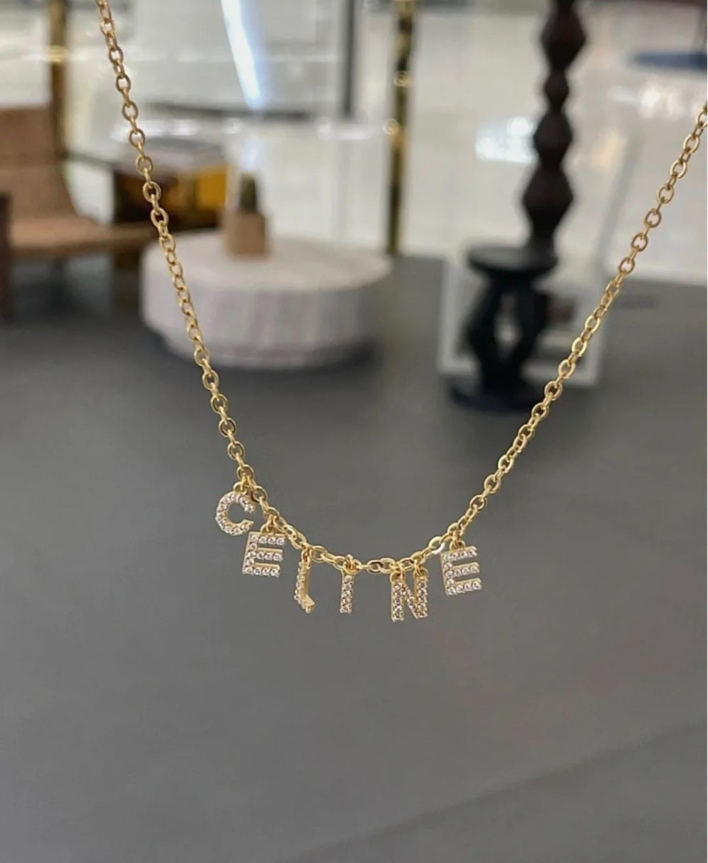 Dây chuyền Celine gold charm chữ