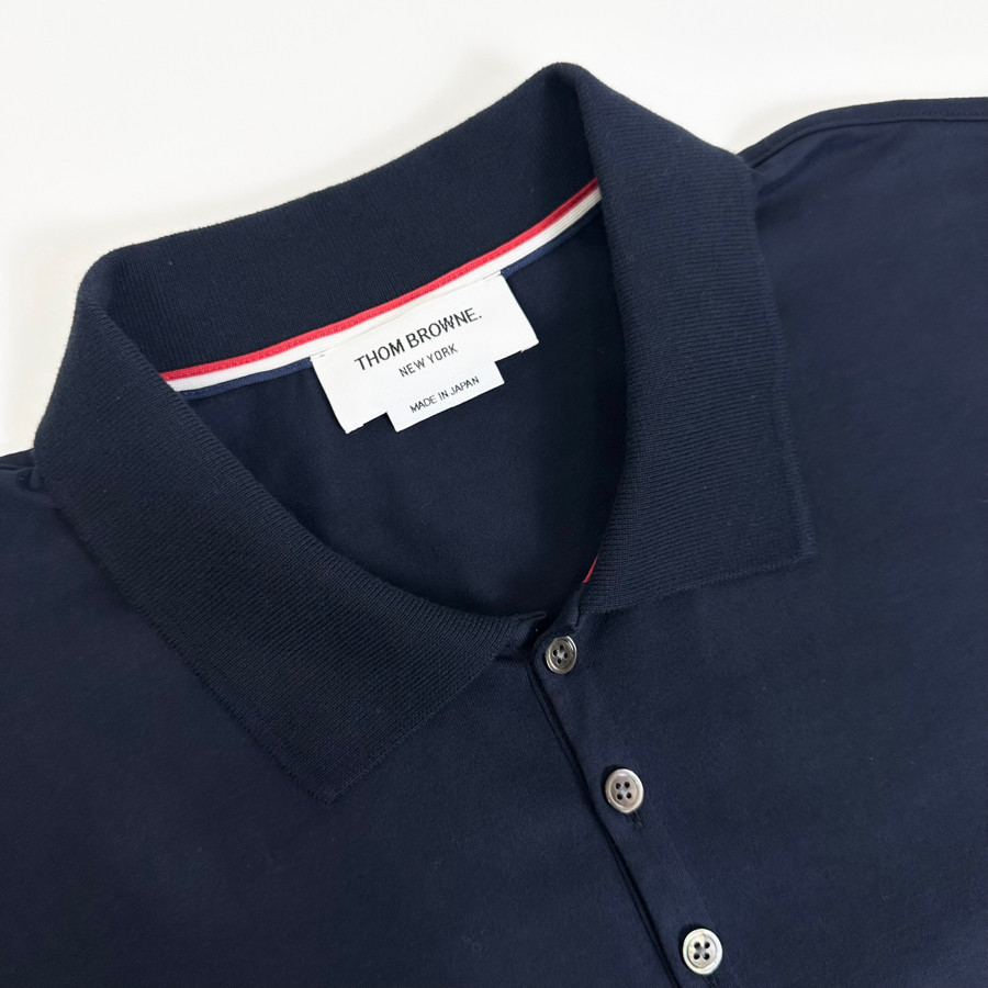 Polo Thom Browne xanh navy