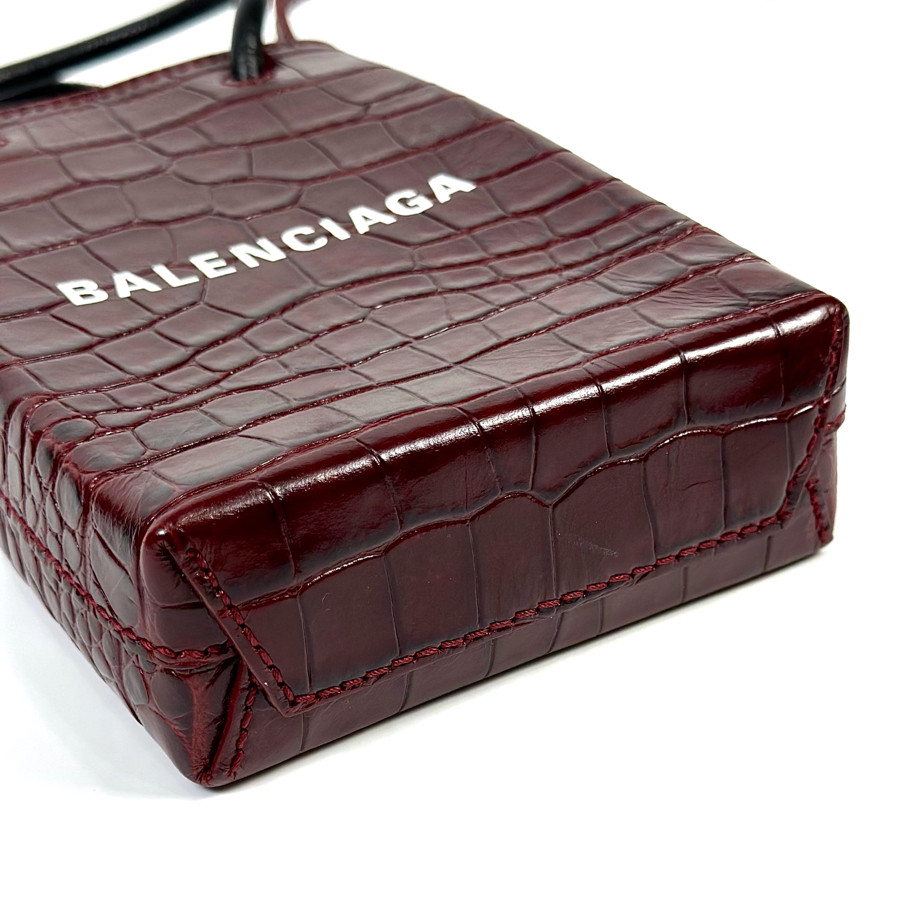 Phonebag Balenciaga đỏ mận