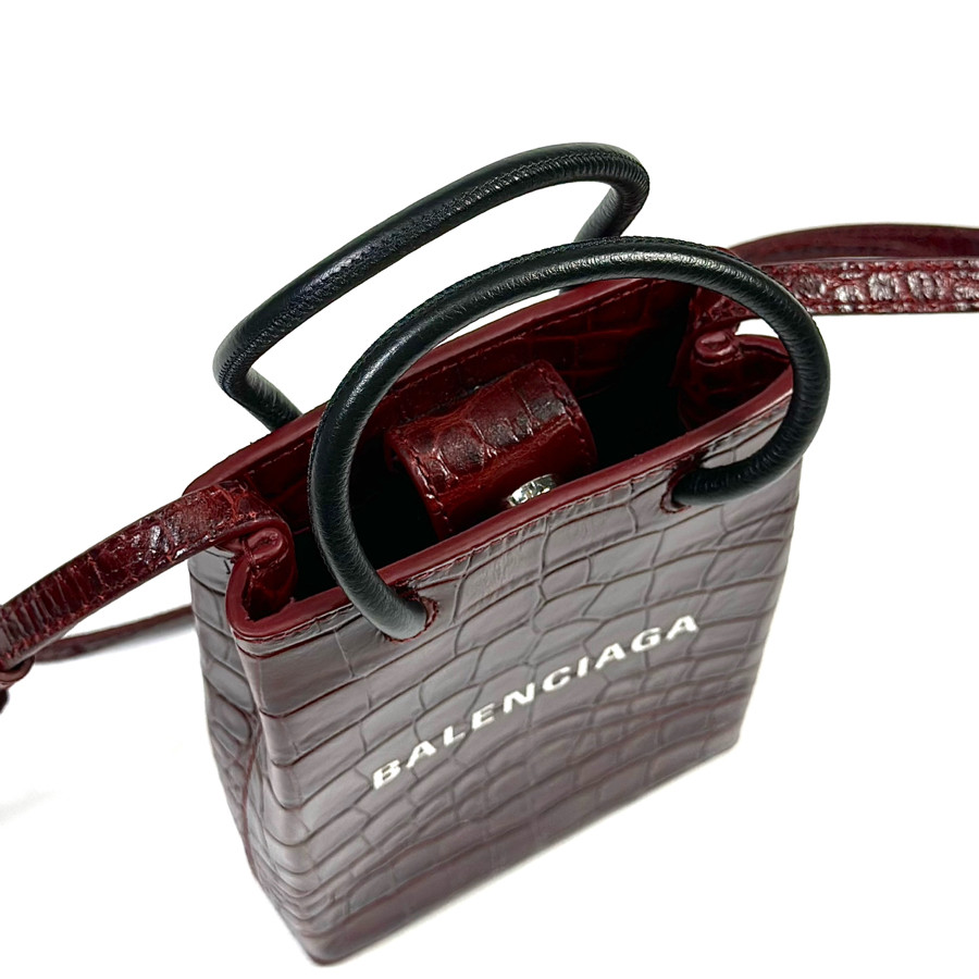 Phonebag Balenciaga đỏ mận